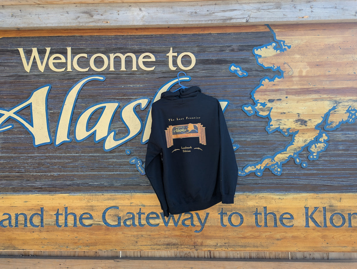 Welcome to Alaska Sign Hoodie — Bring Skagway's Signature Landmark Home.