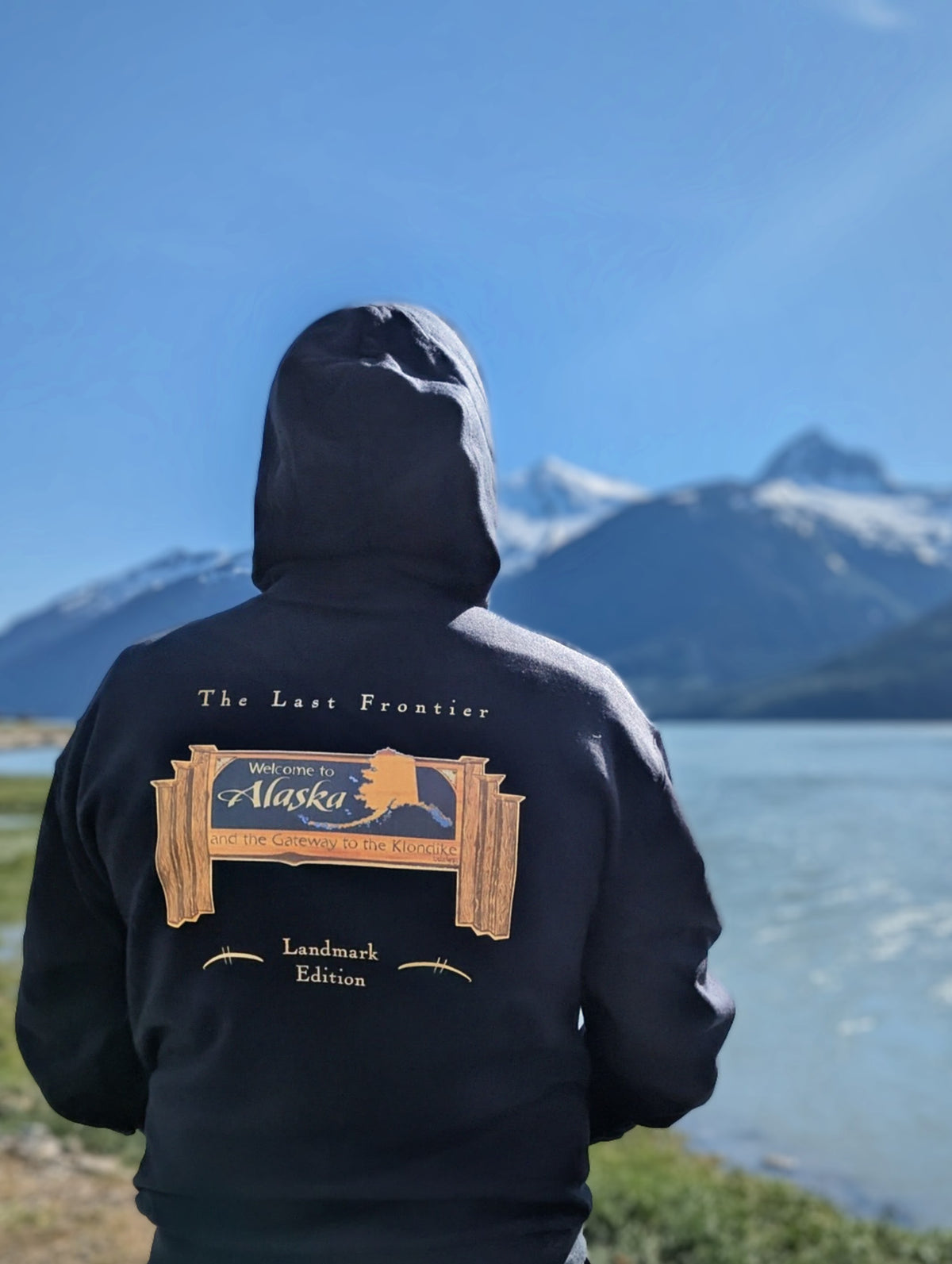 Welcome to Alaska Sign Hoodie — Bring Skagway's Signature Landmark Home.